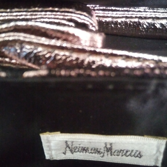 Silver Clutch Purse with rose enclustered.